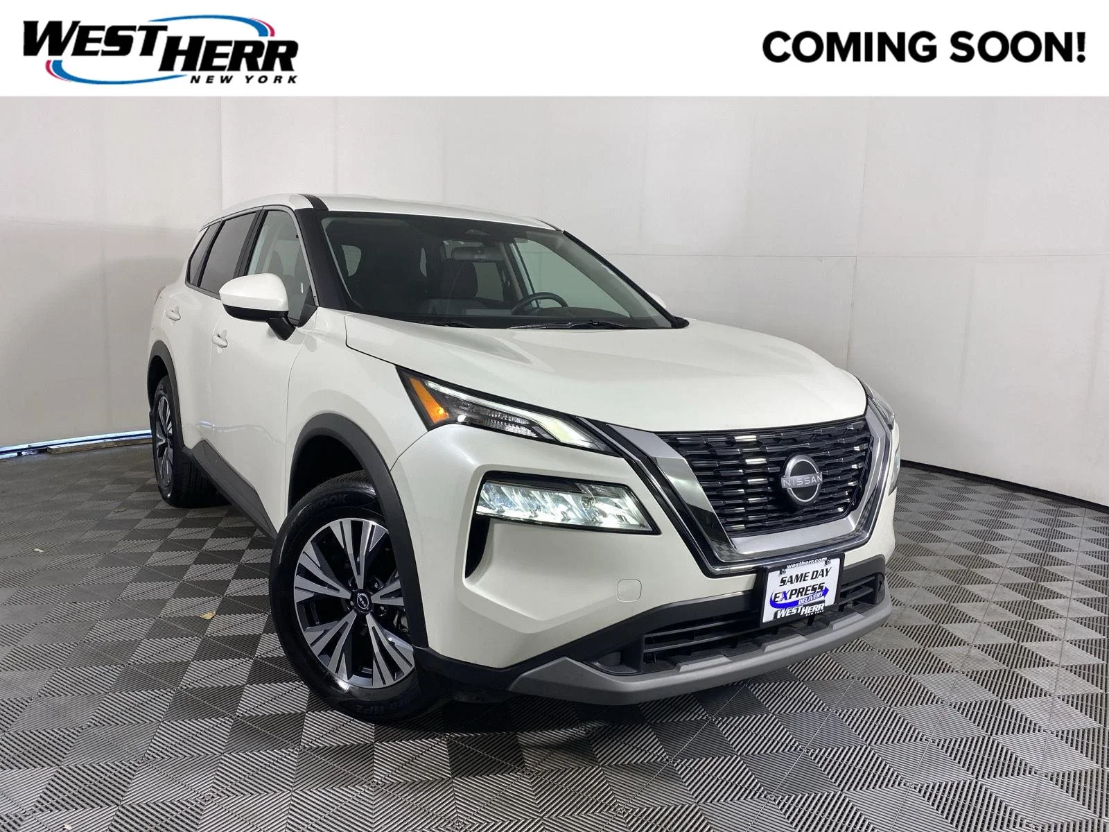 Used 2023 Pearl White Tricoat Nissan SV image 1