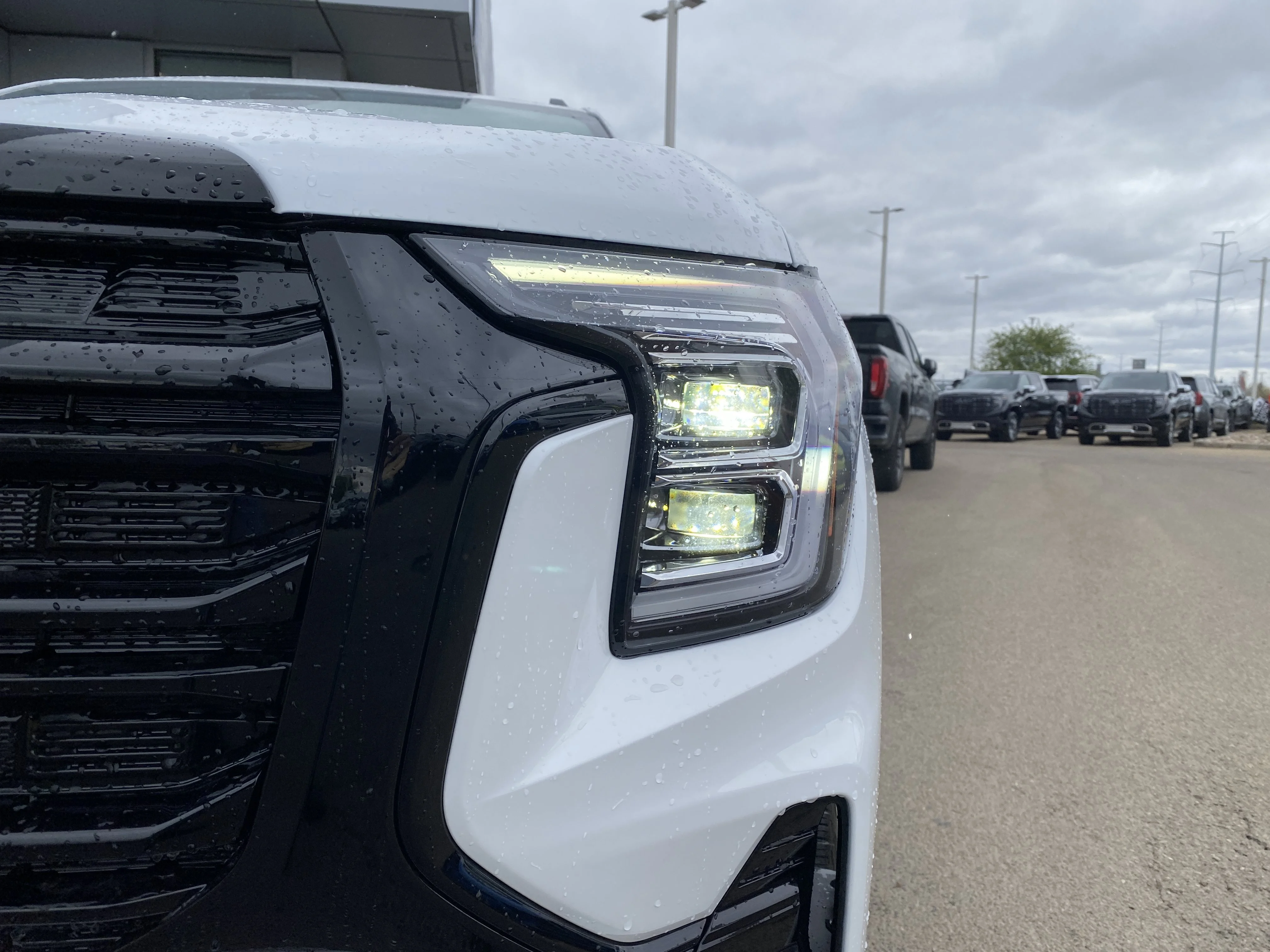 New 2026 Summit White GMC AWD Elevation image 10