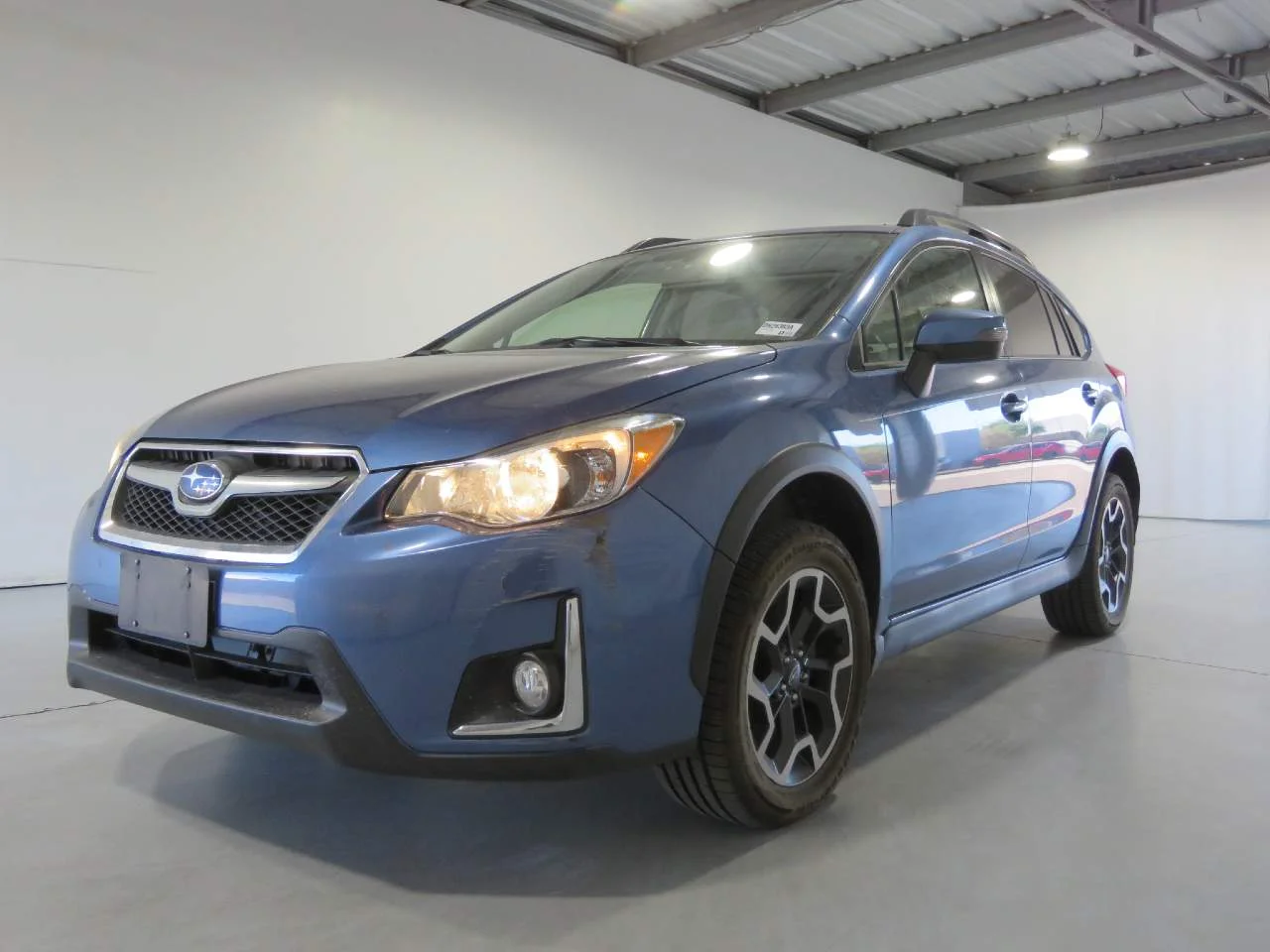 Used 2016 Quartz Blue Pearl Subaru 2.0i Limited image 1