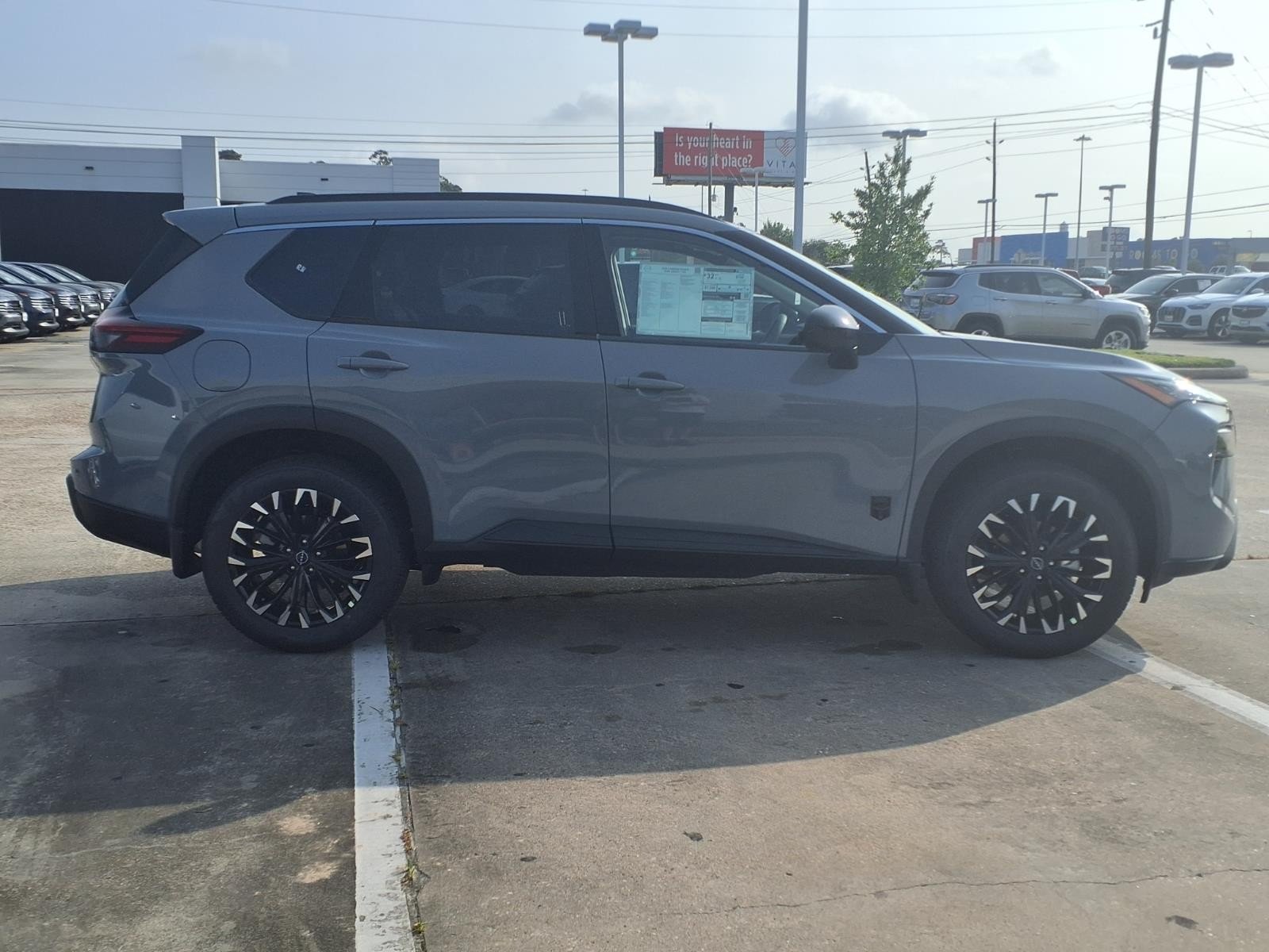 New 2026 Boulder Gray Pearl Nissan Dark Armor image 8