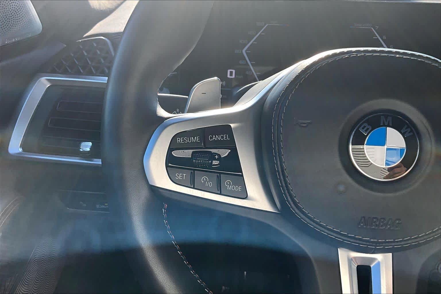 Used 2025 Mineral White Metallic BMW M60i image 24