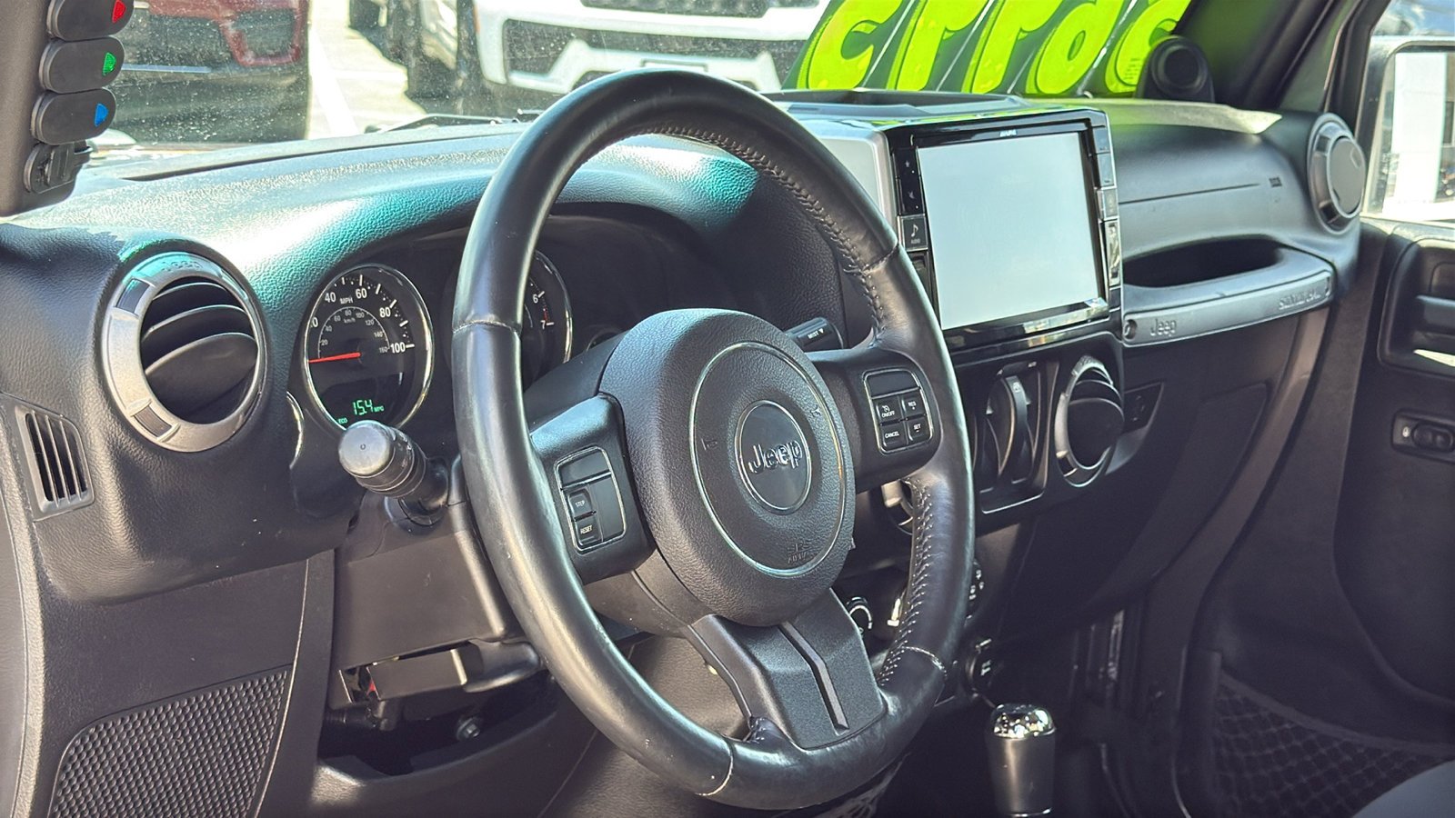 Used 2014 Granite Crystal Metallic Clearcoat Jeep Sport image 10