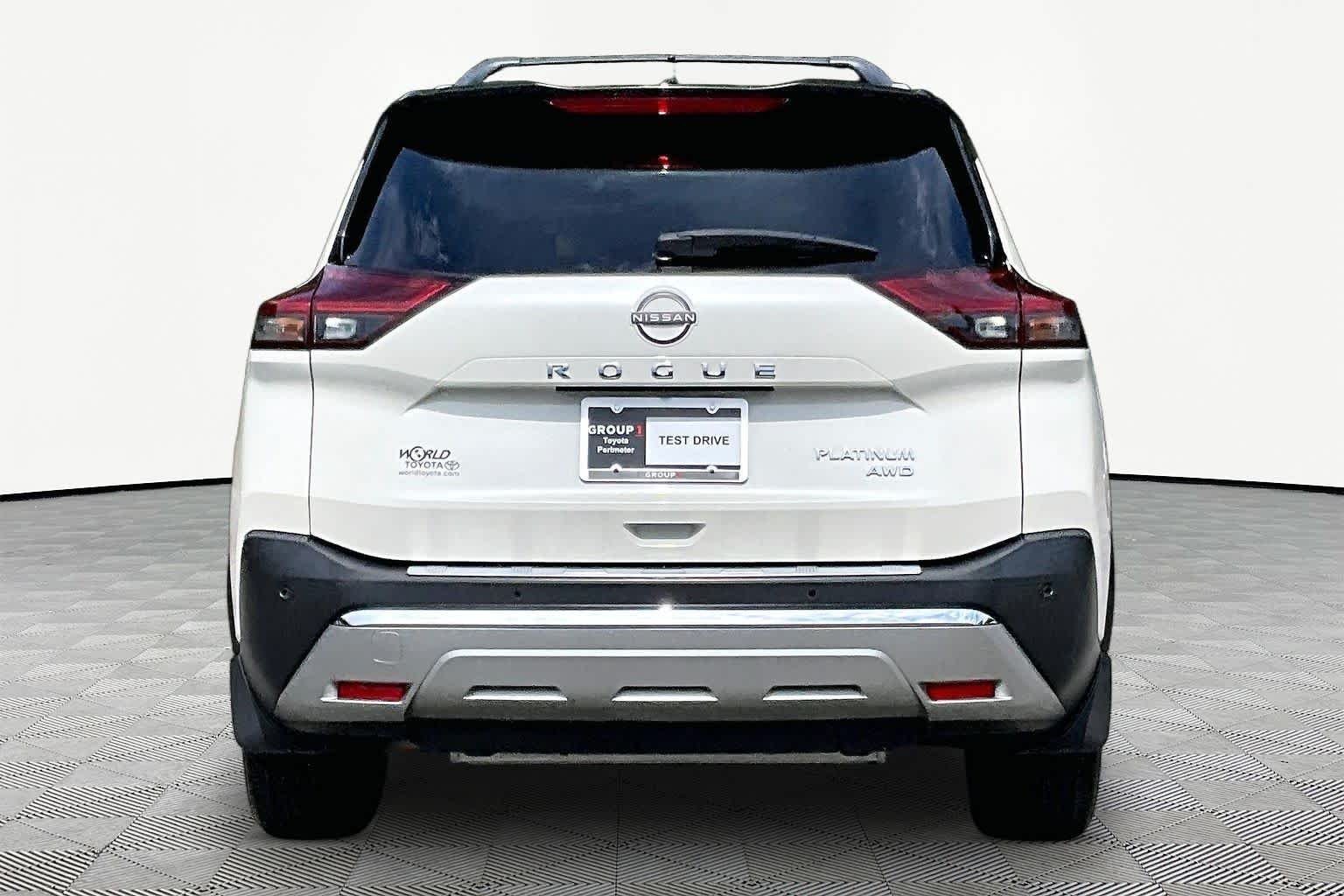 Used 2023 Pearl White Tricoat/Super Black Nissan Platinum image 5