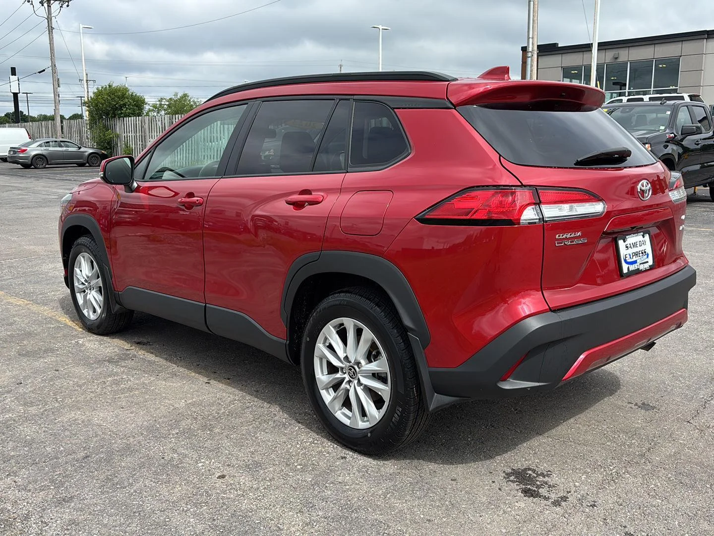 Used 2023 Barcelona Red Metallic Toyota LE image 5