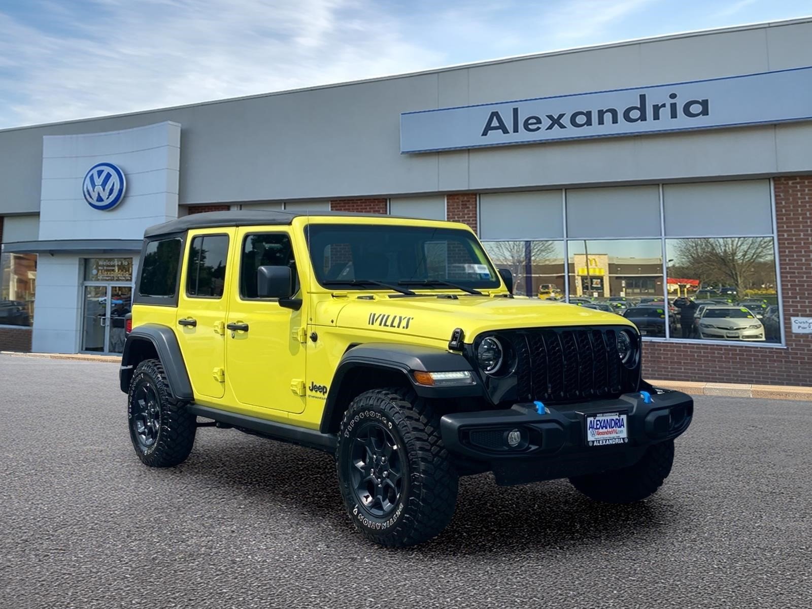 Used 2023 Yellow Jeep Willys 4xe image 1