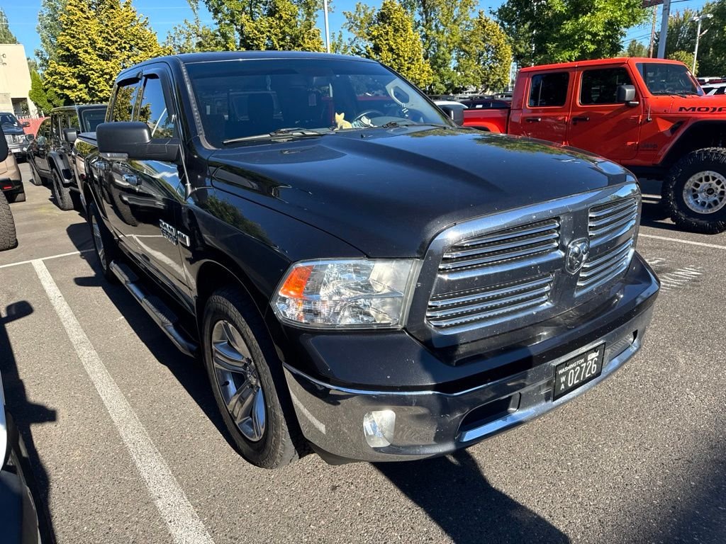 Used 2018 Brilliant Black Crystal Pearlcoat Ram SLT image 1