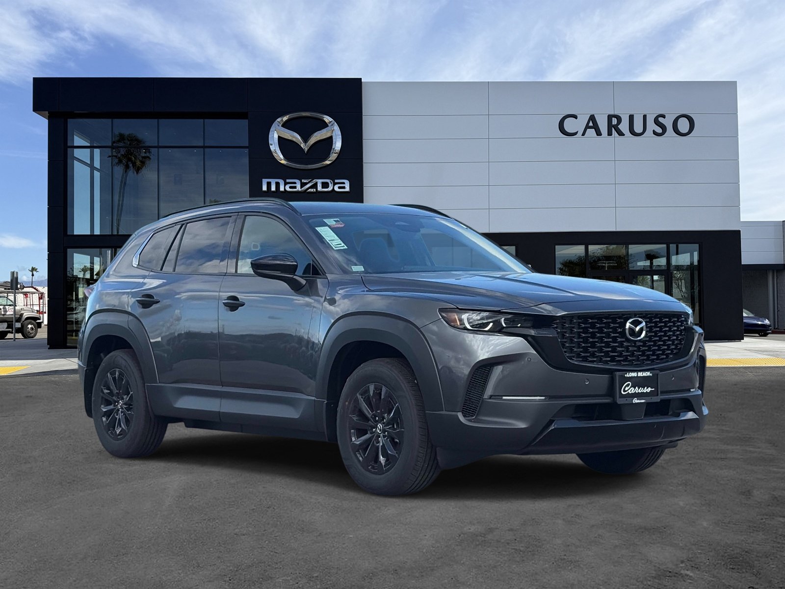 New 2026 Machine Gray Metallic Mazda Premium AWD image 1