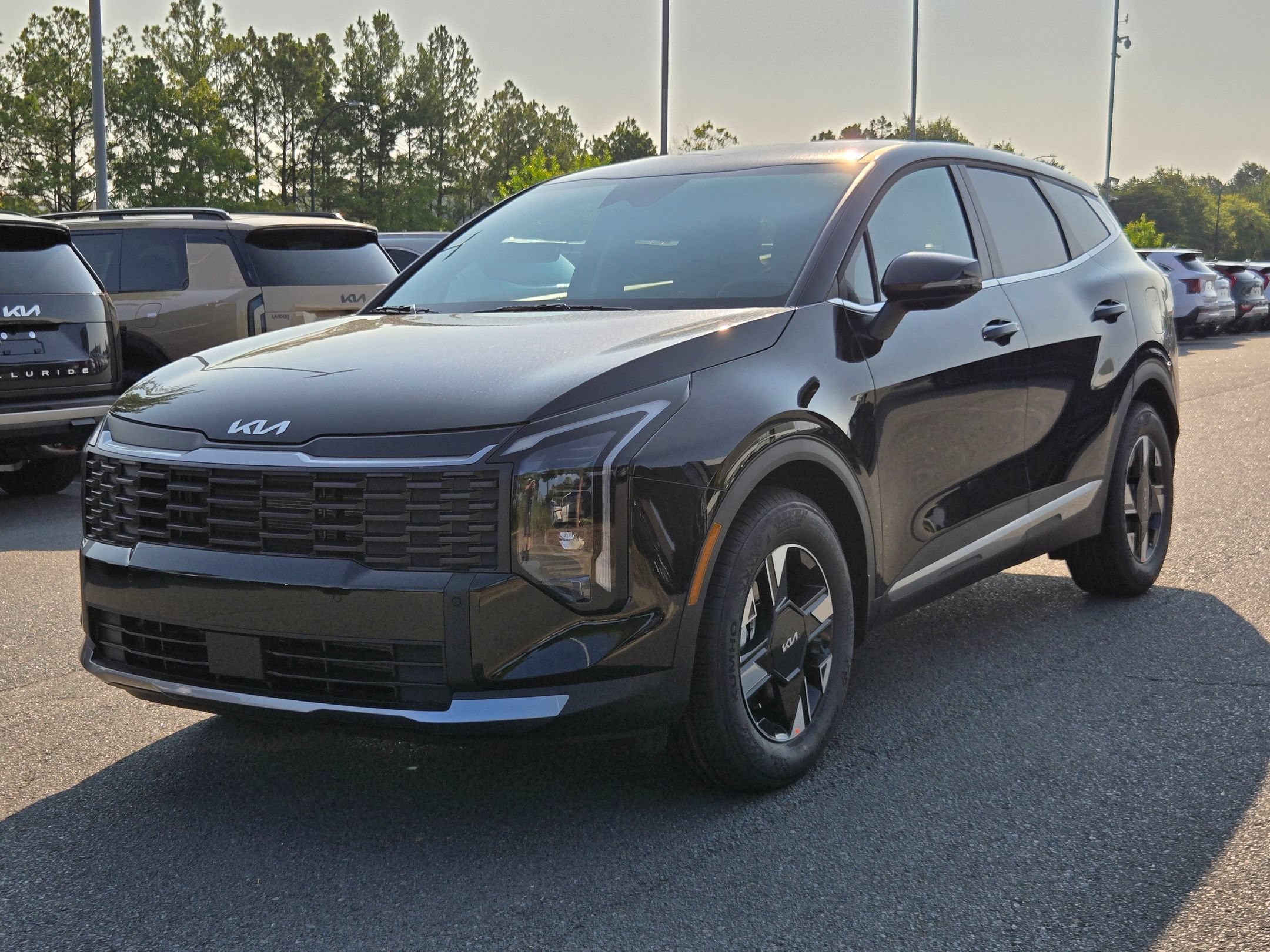 New 2026 Ebony Black Kia LX image 3