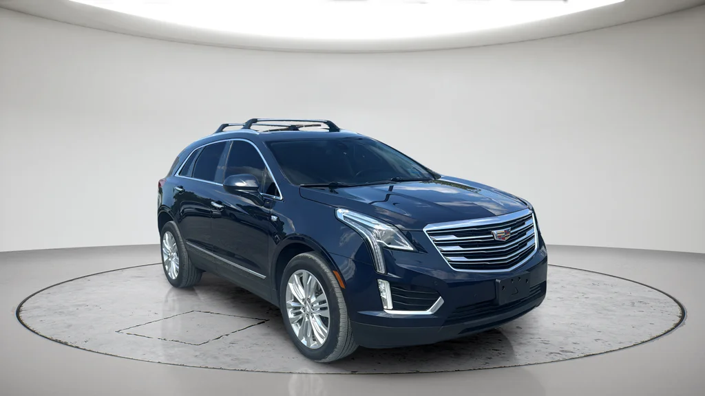 Used 2017 Blue Cadillac Premium Luxury image 1