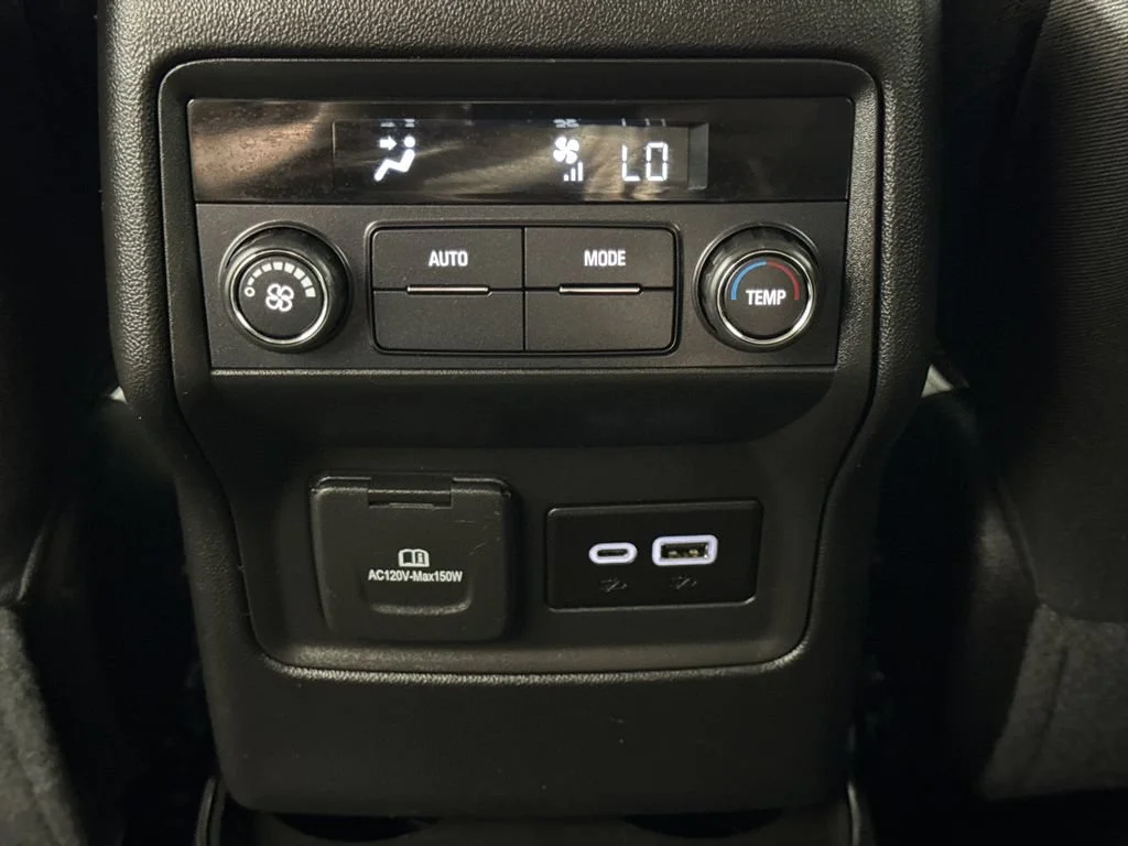 Used 2023 EBONY TWILIGHT METALLIC GMC AT4 image 14