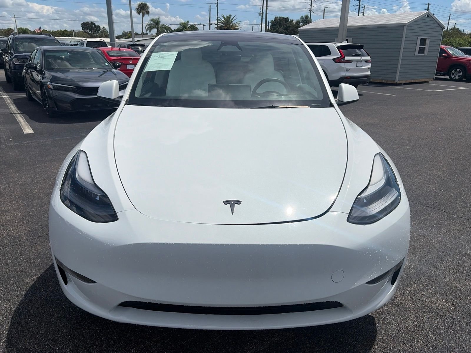 Used 2023 Tesla Model Y Long Range with VIN 7SAYGDEE6PF890285 for sale in Port Richey, FL