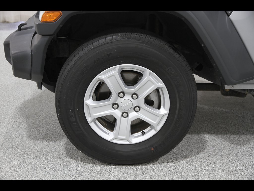 Used 2018 Billet Silver Metallic Clear Coat Jeep Sport S image 21