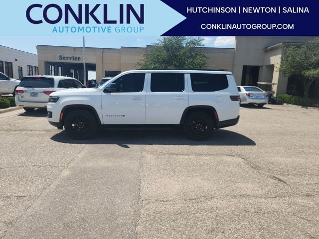 Used 2024 Bright White Clearcoat Jeep Series II image 1