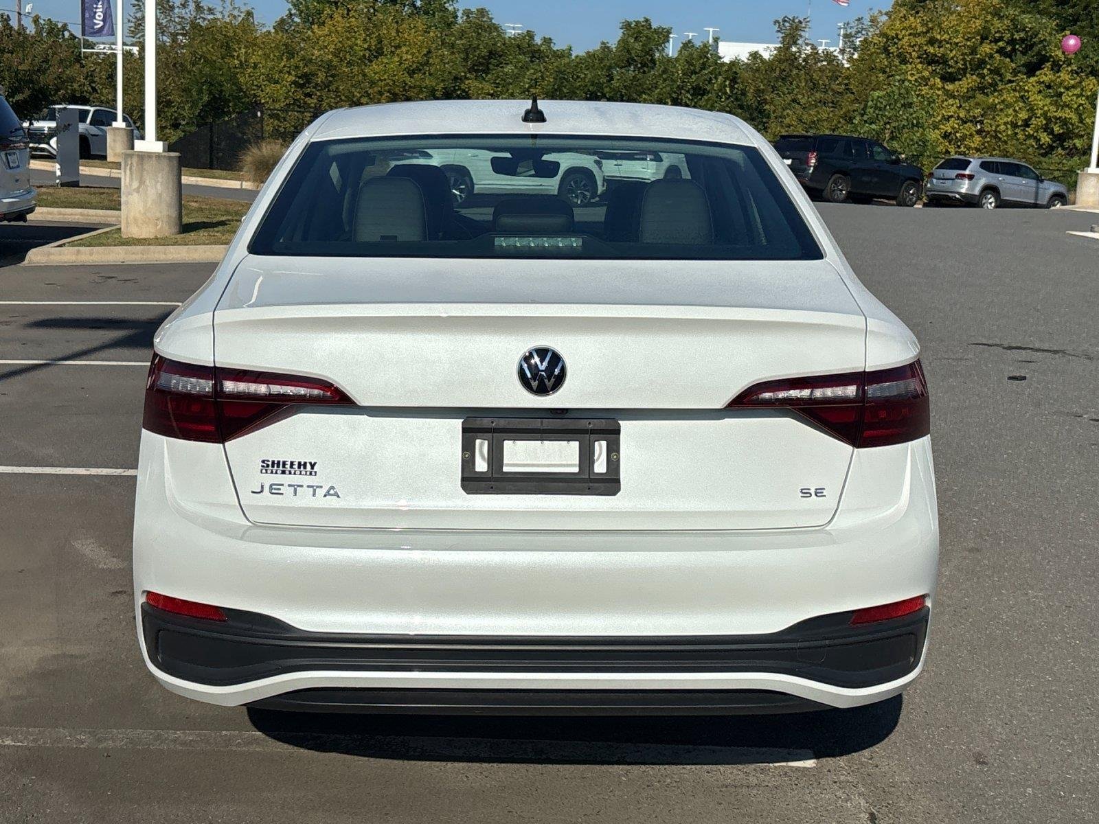 Used 2023 Opal White Pearl Volkswagen SE image 4