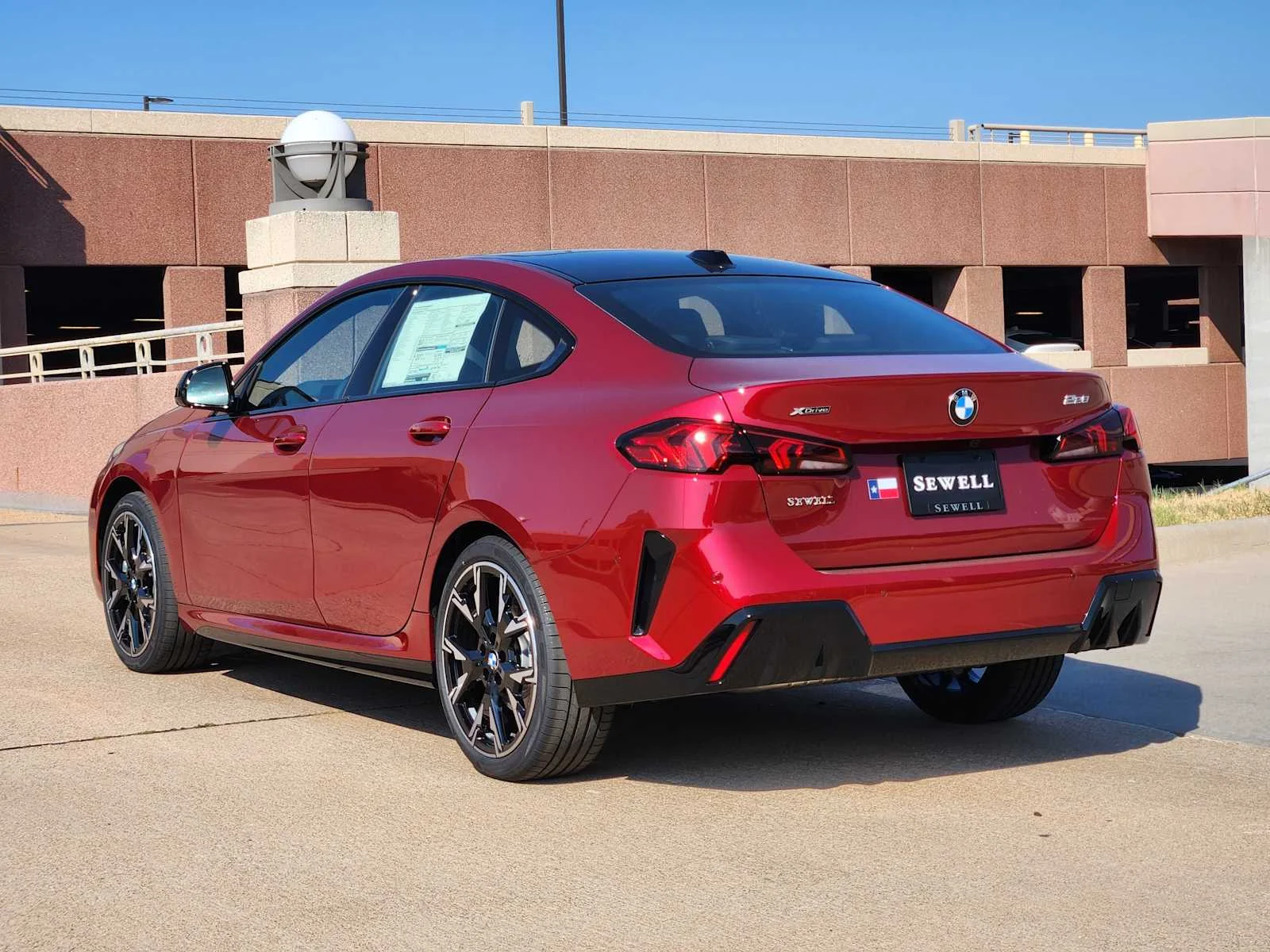 New 2026 Vegas Red Metallic BMW 228 xDrive image 3