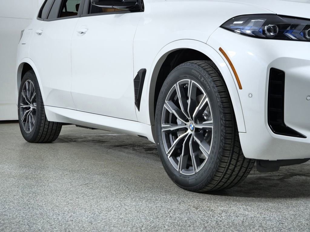 Used 2026 Mineral White Metallic BMW xDrive50e image 7