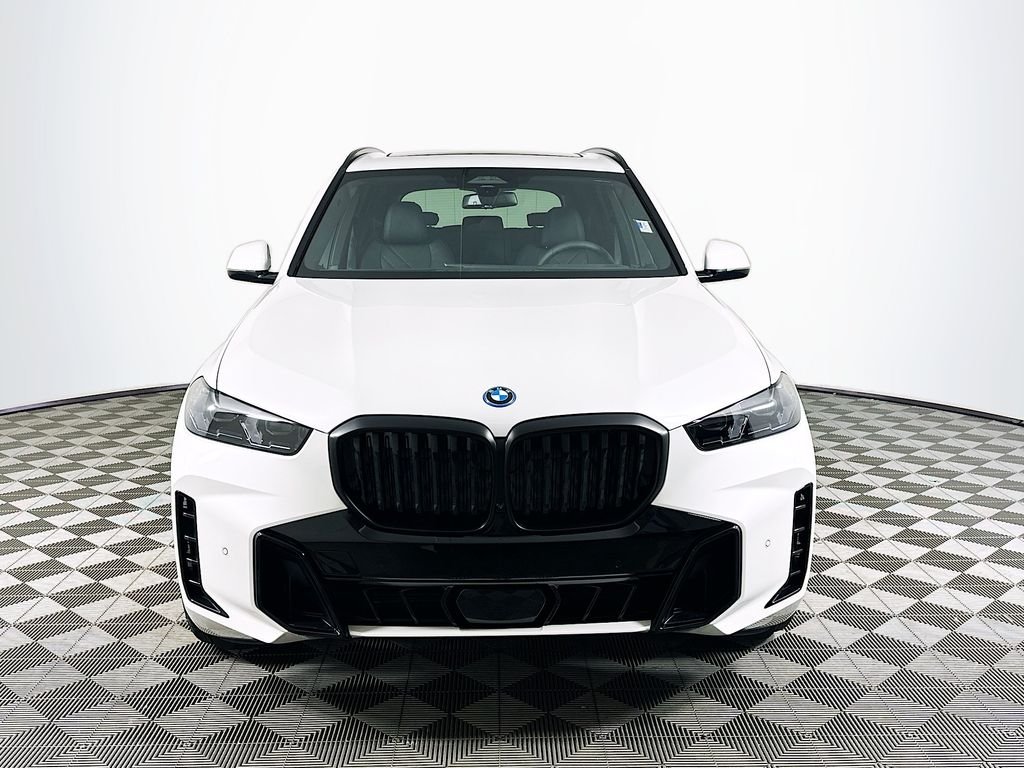Used 2026 White Metallic BMW xDrive50e image 2