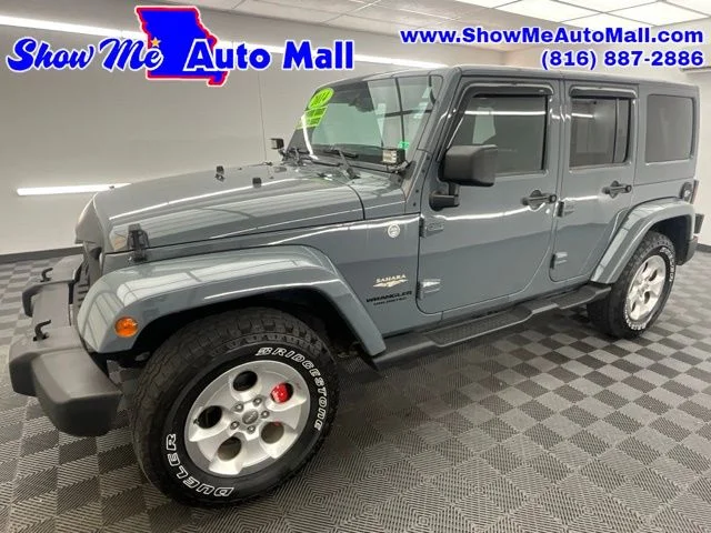 Used 2014 Gray Jeep Unlimited Sahara image 1