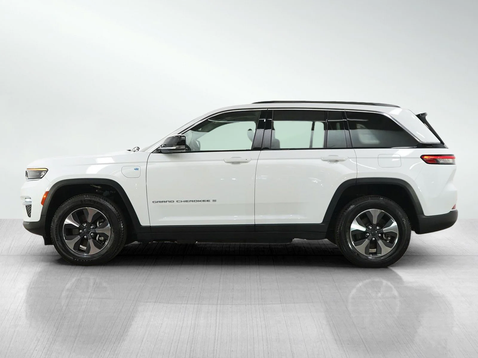 Used 2023 Jeep Grand Cherokee 4xe with VIN 1C4RJYB6XPC624451 for sale in Minneapolis, Minnesota