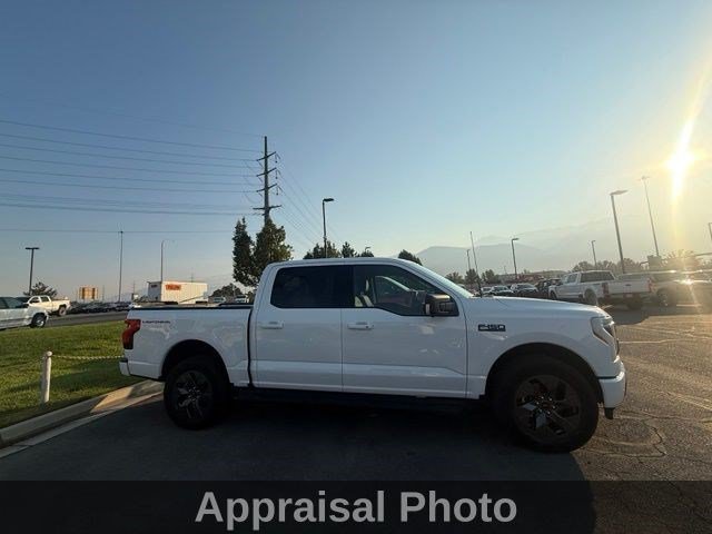 Used 2024 Ford F-150 Lightning Flash with VIN 1FT6W3L78RWG24657 for sale in American Fork, UT