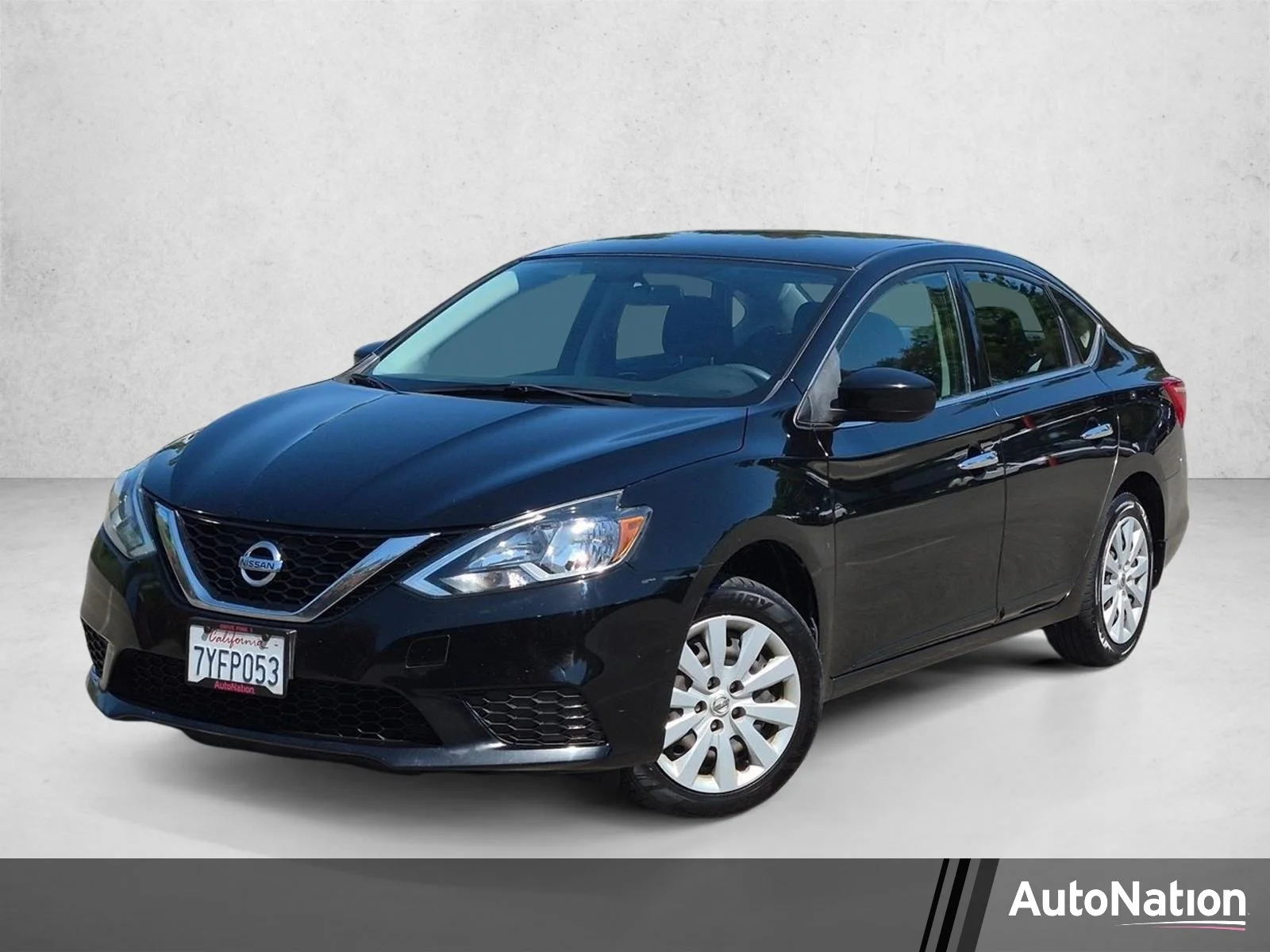 Used 2017 Super Black Nissan SV image 1