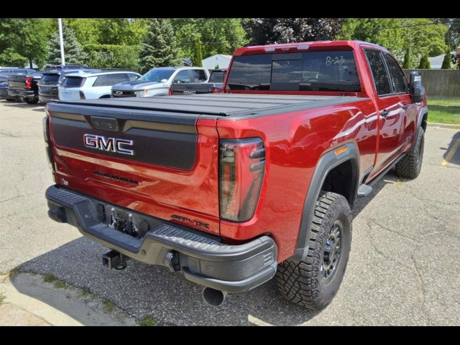 Used 2026 Volcanic Red Tintcoat GMC AT4X image 6