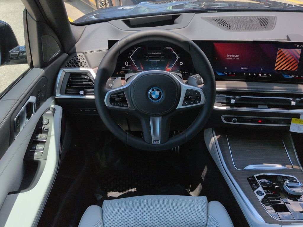 New 2026 Tanzanite Blue II Metallic BMW xDrive50e image 16