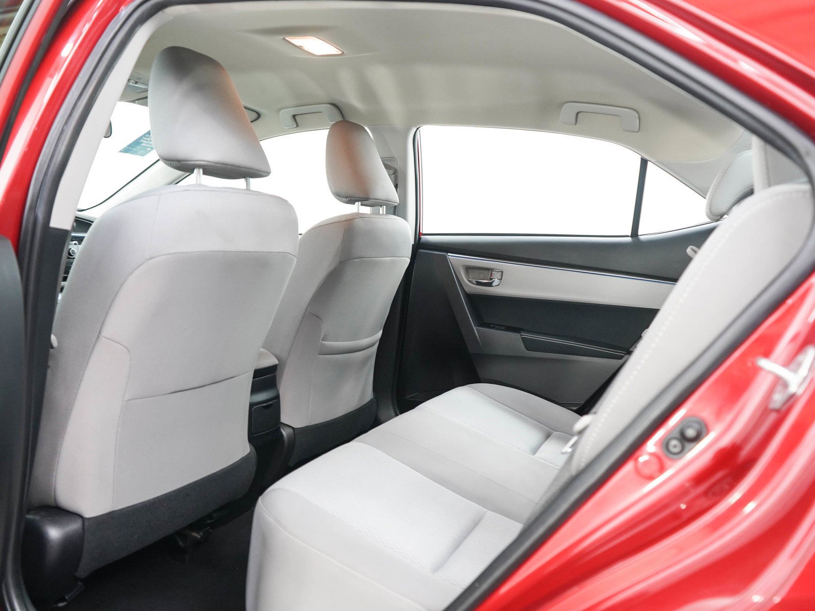 Used 2016 Barcelona Red Metallic Toyota LE image 16
