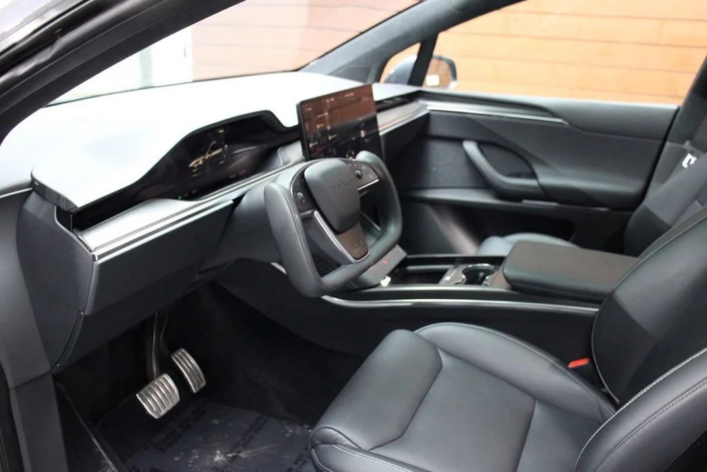 Used 2022 Solid Black Tesla Plaid image 9