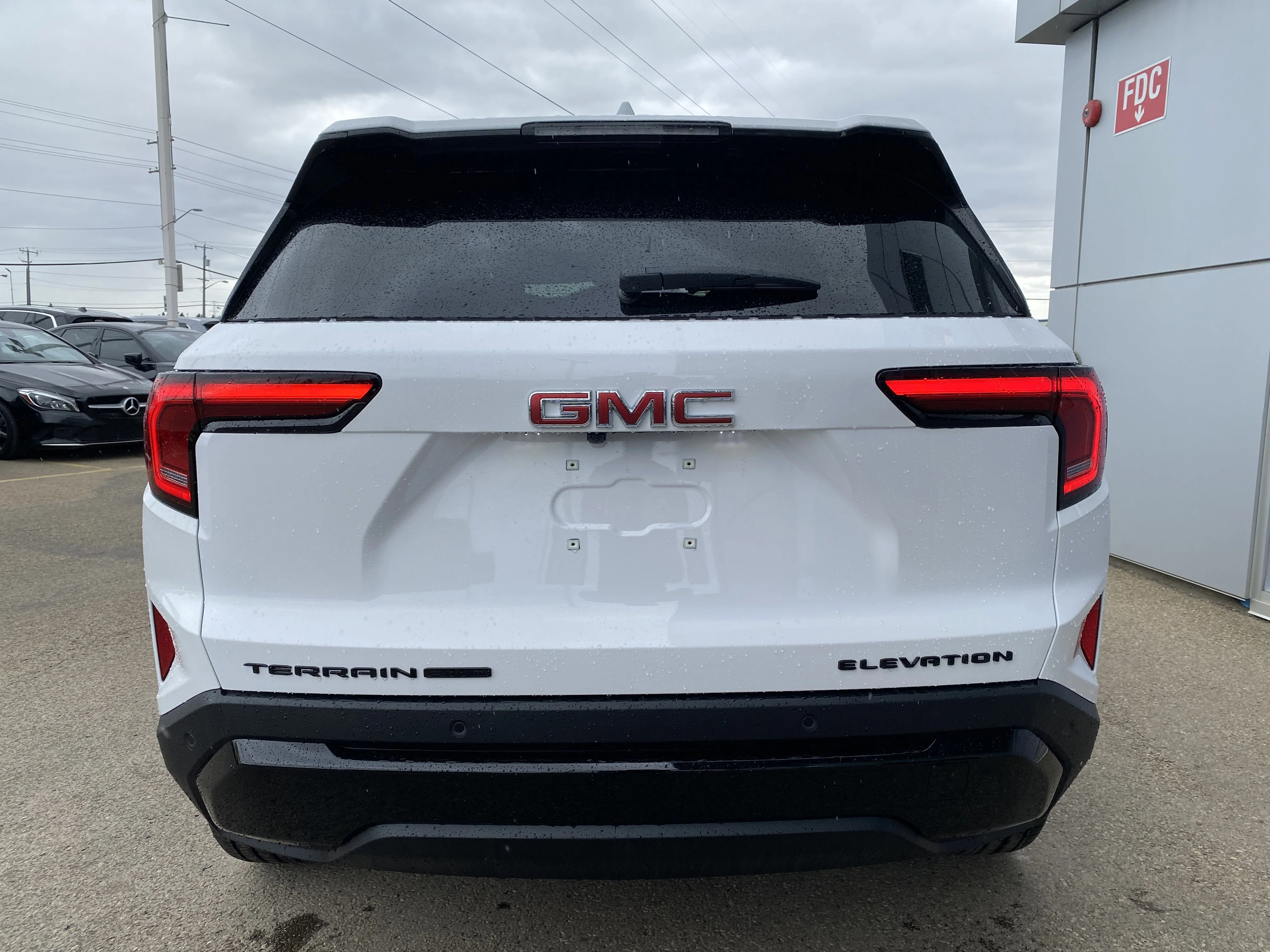 New 2026 Summit White GMC AWD Elevation image 5