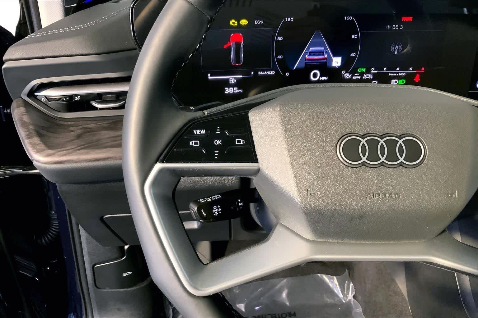 Used 2025 Navarra Blue Metallic Audi Premium image 24
