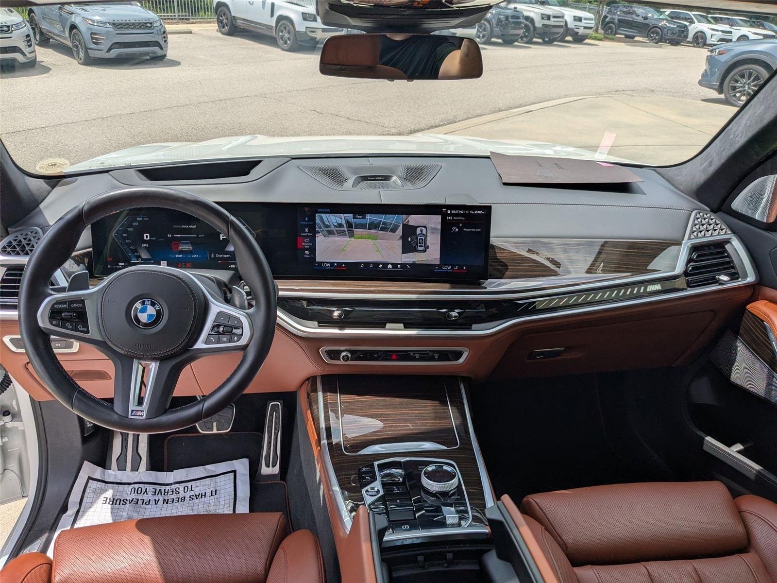Used 2024 Mineral White Metallic BMW M60i image 28