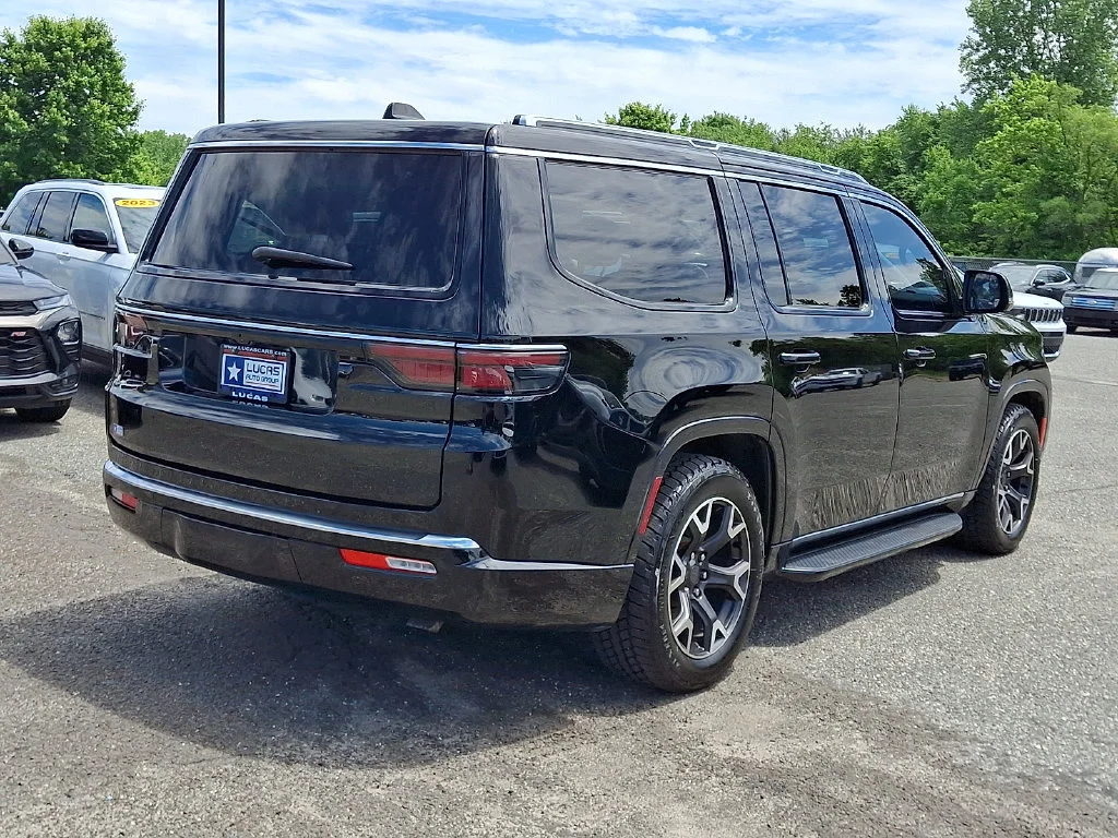 Used 2023 Diamond Black Crystal Pearlcoat Jeep Series III image 12