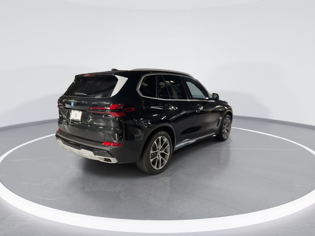 New 2026 Black Sapphire Metallic BMW xDrive50e image 8