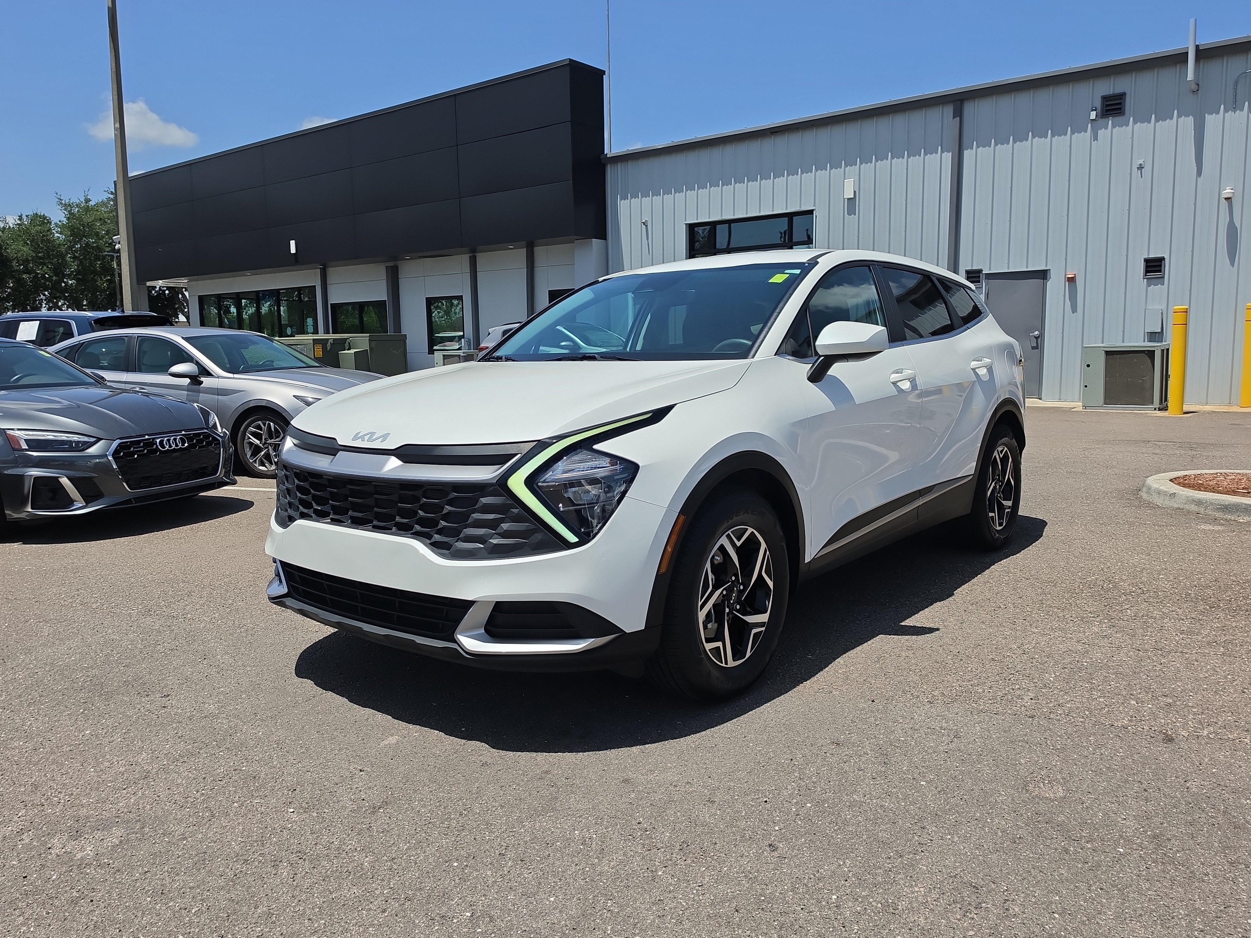 Certified Used 2023 Snow White Pearl Kia LX image 4