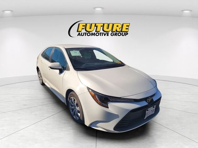 Used 2023 White Toyota LE image 1