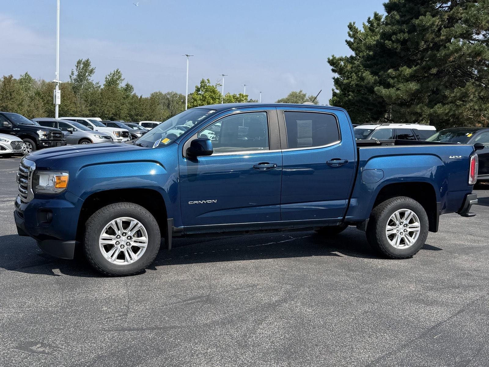 Used 2020 Blue Emerald Metallic GMC 4WD SLE image 6