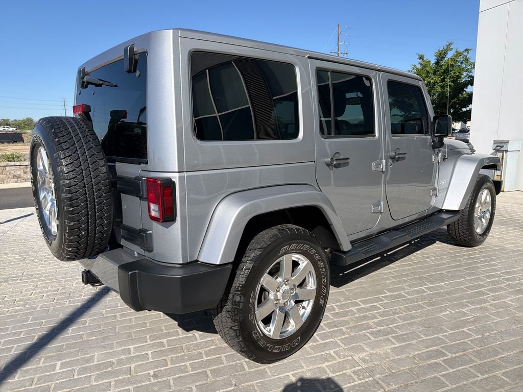 Used 2016 Silver Jeep Unlimited Sahara image 5
