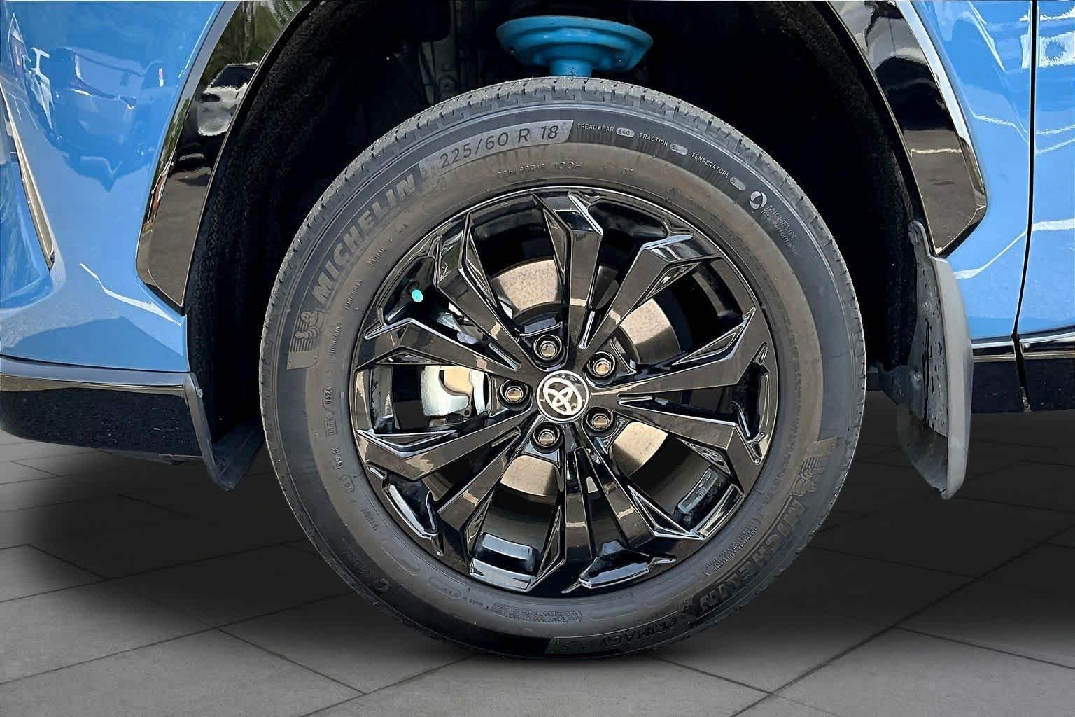 Used 2024 Cavalry Blue/Midnight Black Metallic Toyota Hybrid XSE image 11