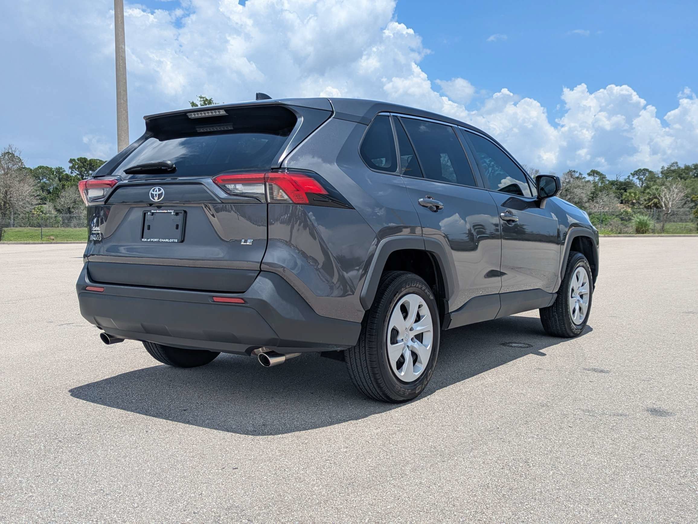 Used 2024 Magnetic Gray Metallic Toyota LE image 4