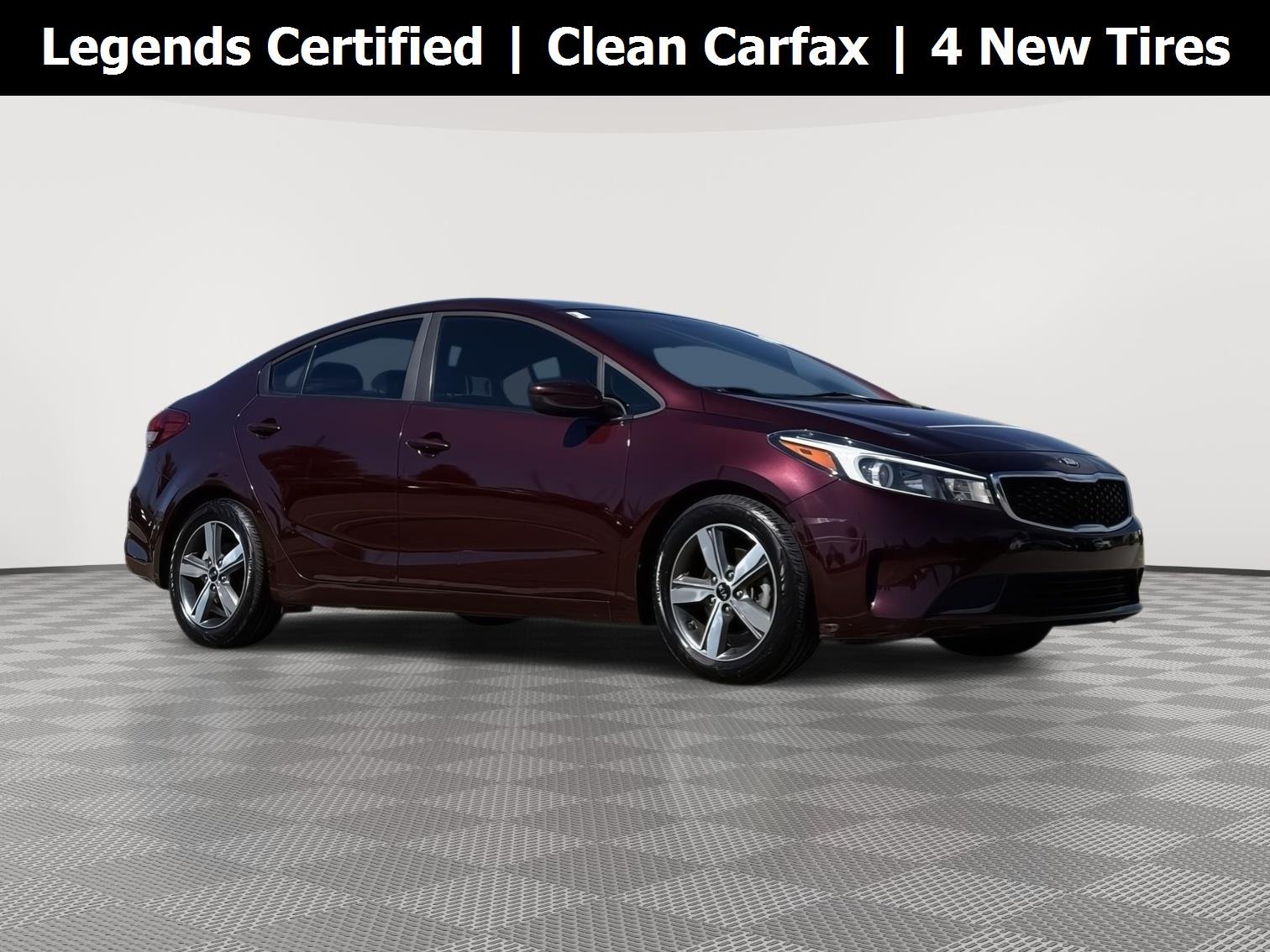 Used 2018 Garnet Red Kia LX image 1