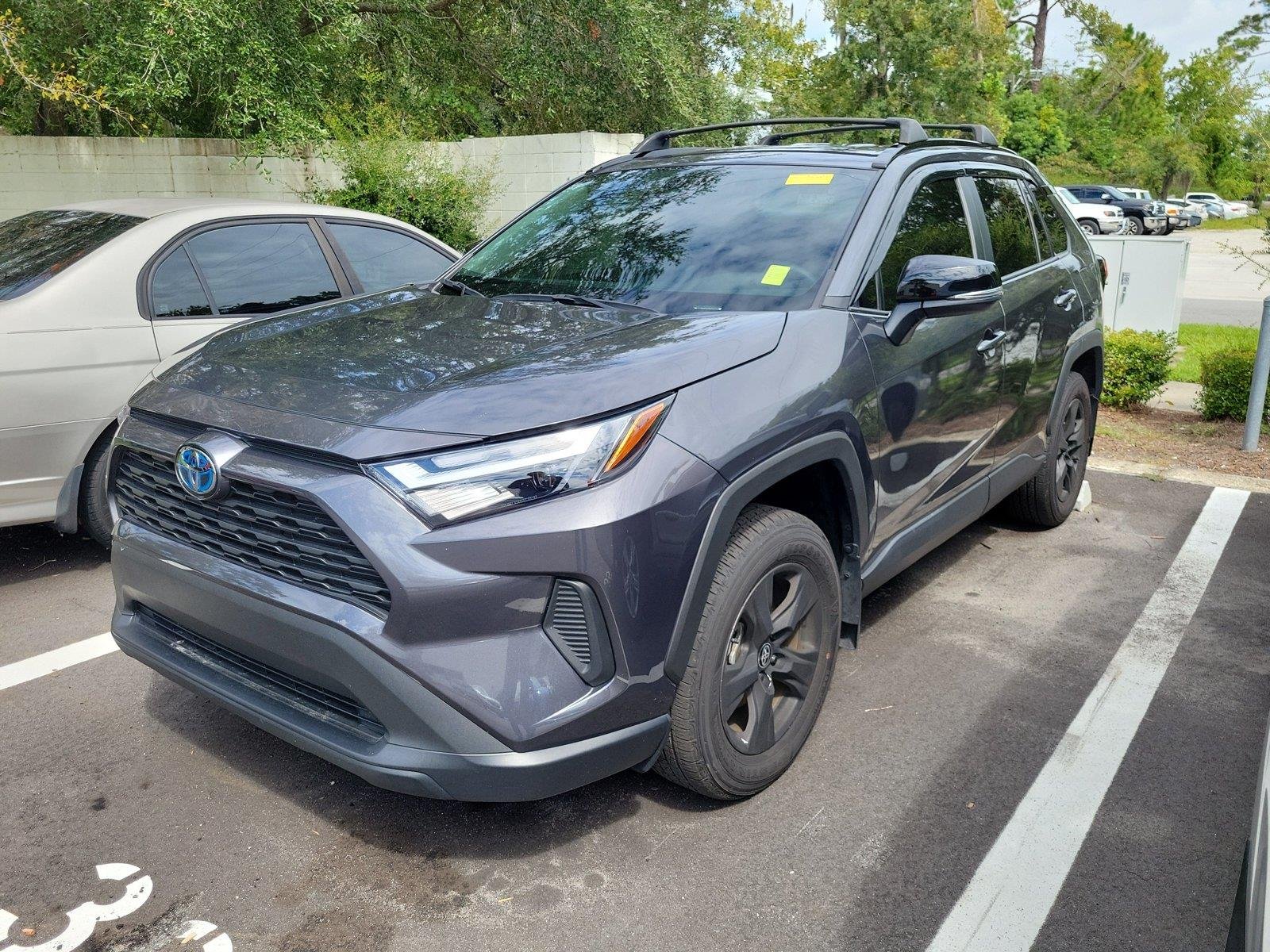 Used 2024 Magnetic Gray Metallic Toyota Hybrid XLE image 1