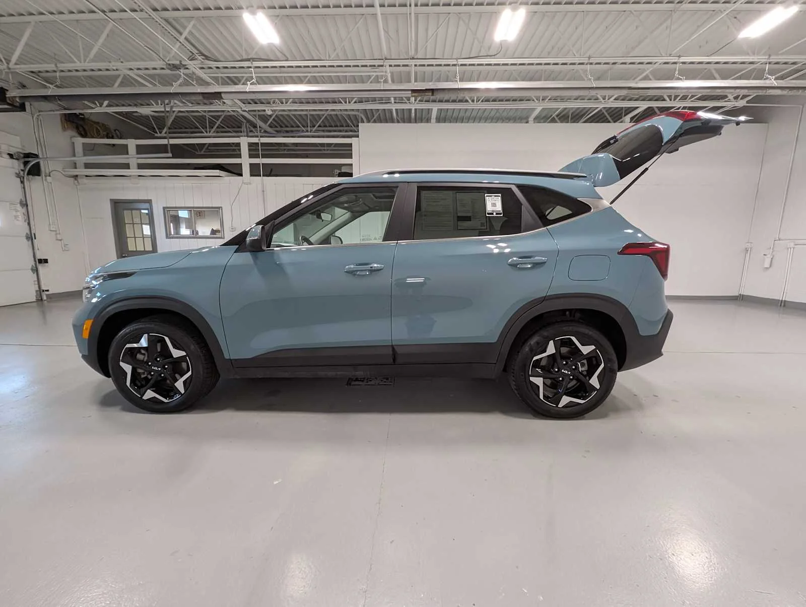 Certified Used 2024 Pluton Blue Kia EX image 13