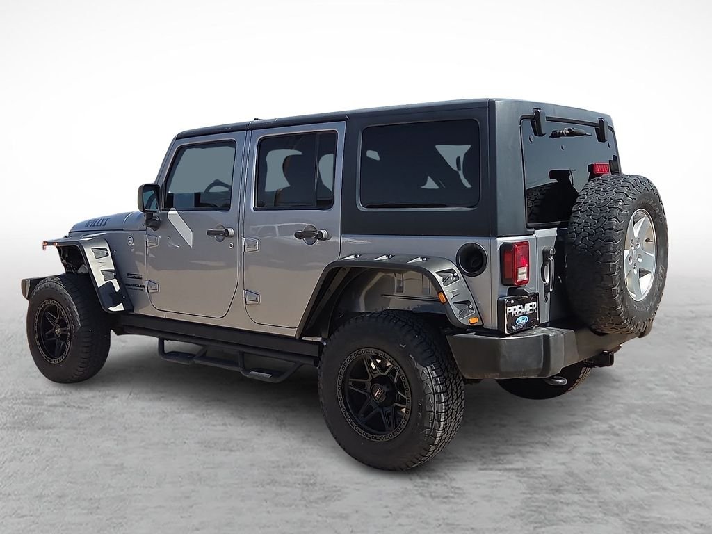 Used 2016 Billet Silver Metallic Clearcoat Jeep Unlimited Sport image 7