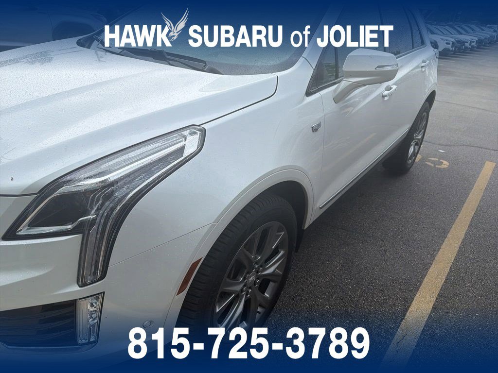 Used 2020 Crystal White Tricoat Cadillac Sport AWD image 1