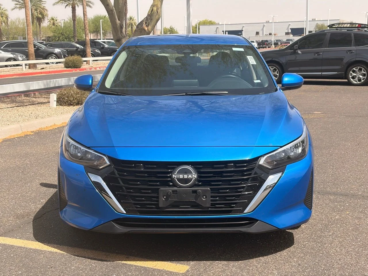 Used 2024 Electric Blue Metallic Nissan SV image 8