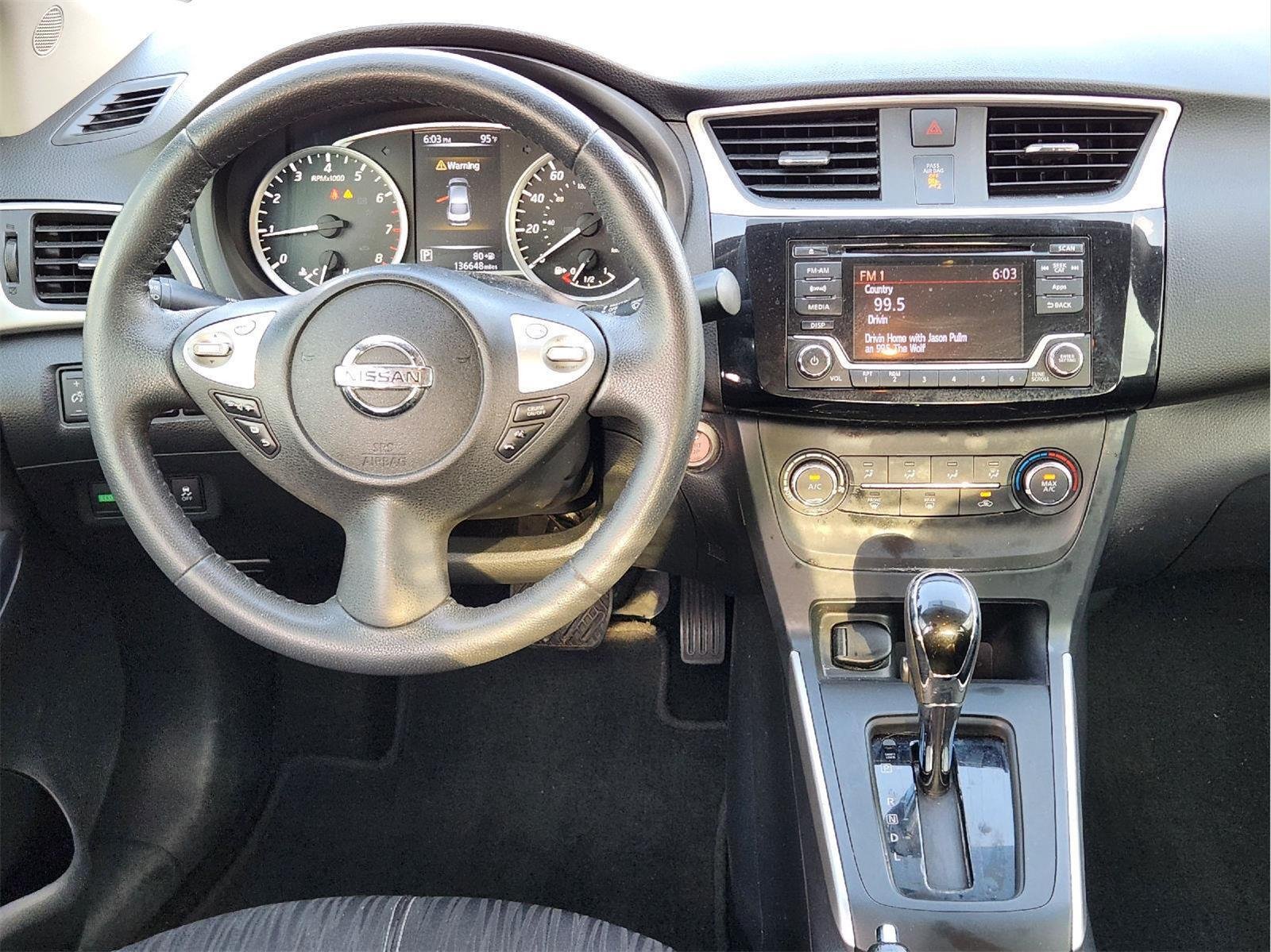Used 2016 Super Black Nissan SV image 28
