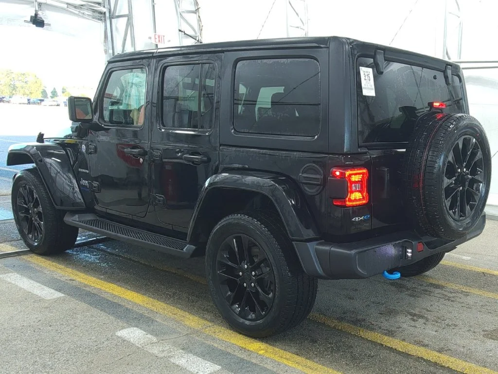 Used 2023 Black Jeep Sahara 4xe image 4