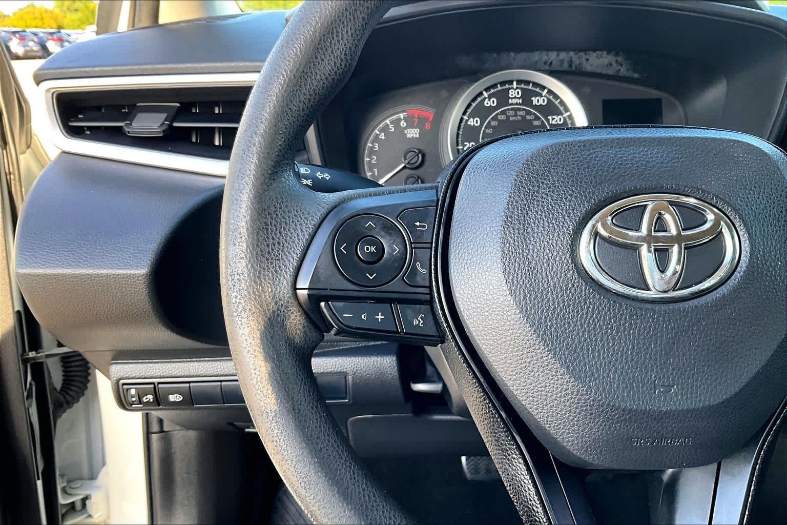 Used 2021 Super White Toyota LE image 24