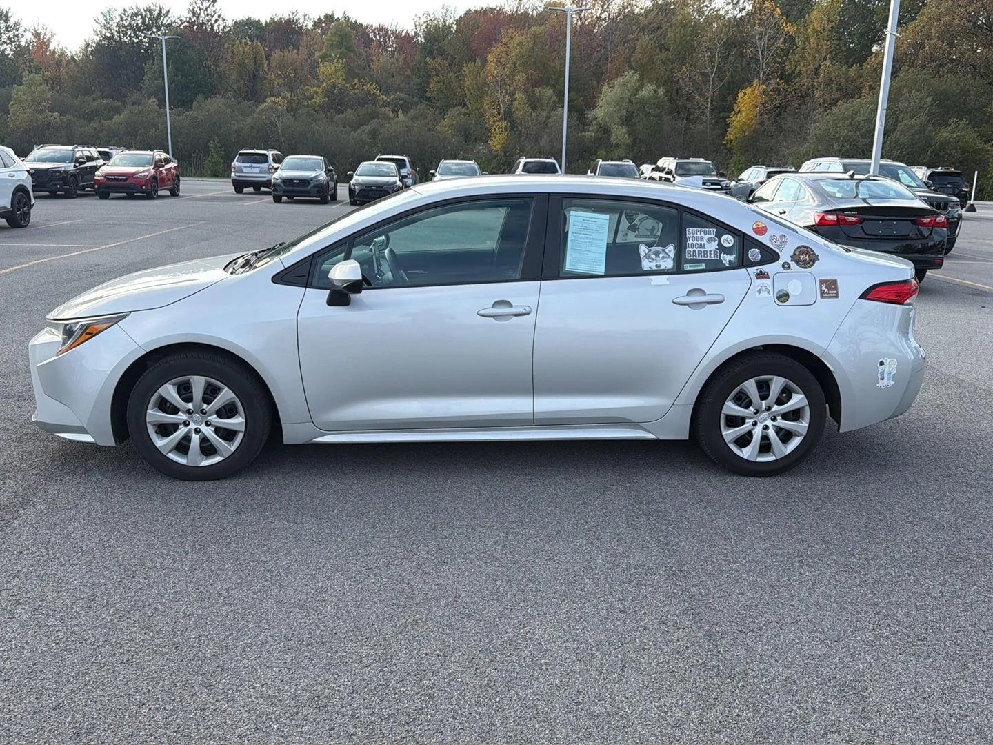 Used 2021 Classic Silver Metallic Toyota LE image 6